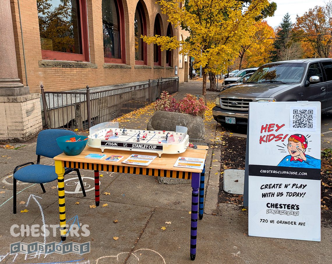 Chester's Clubhouse handed out candy at the 2025 downtown Corvallis Trick or Treat