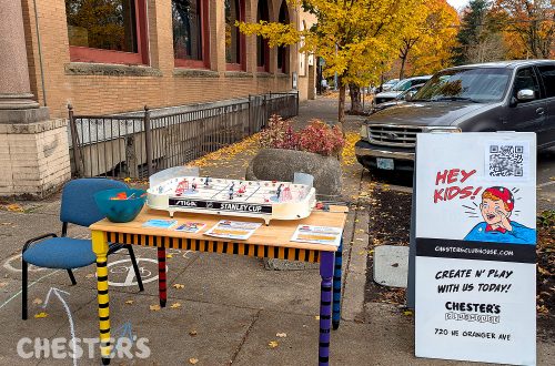 Chester's Clubhouse handed out candy at the 2025 downtown Corvallis Trick or Treat